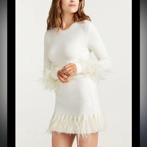Crewneck feather pullover with matching skirt - top is XS skirt is a medium